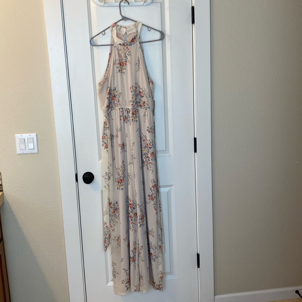 NWT Rokoko jumpsuit size Medium. Keyhole back with removable belt.